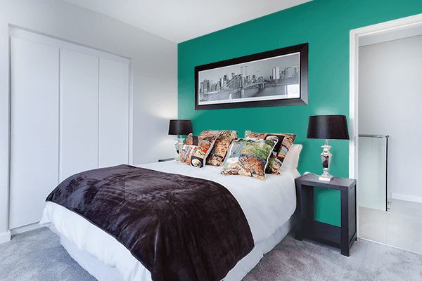 Pretty Photo frame on Teal Green color Bedroom interior wall color