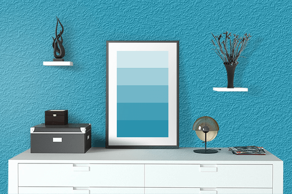 Pretty Photo frame on Cyan Blue color drawing room interior textured wall