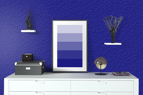 Pretty Photo frame on Dark Blue color drawing room interior textured wall