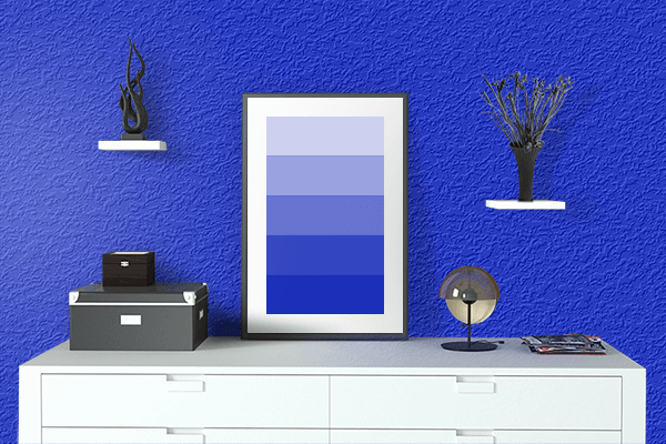 Pretty Photo frame on Medium Blue color drawing room interior textured wall