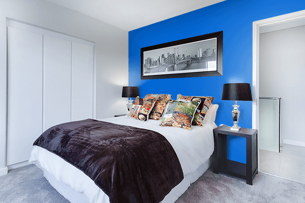 Pretty Photo frame on True Blue color Bedroom interior wall color