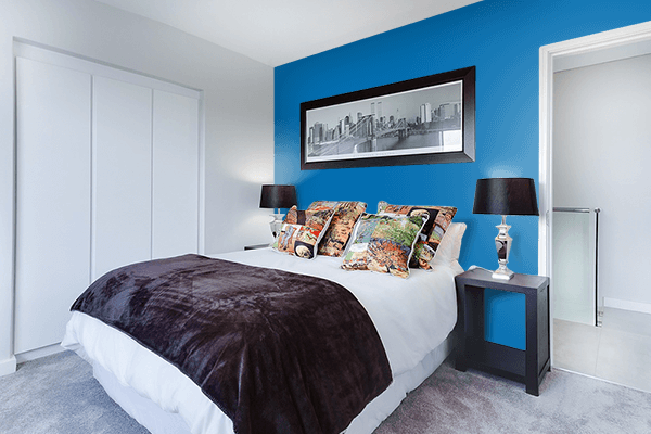 Pretty Photo frame on Honolulu Blue color Bedroom interior wall color