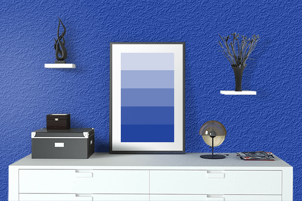 Pretty Photo frame on UA Blue color drawing room interior textured wall