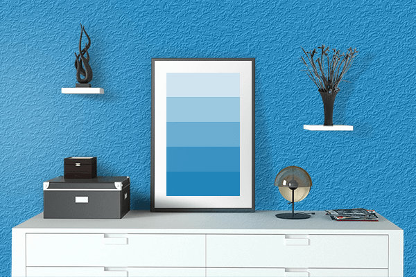 Pretty Photo frame on Rich Electric Blue color drawing room interior textured wall