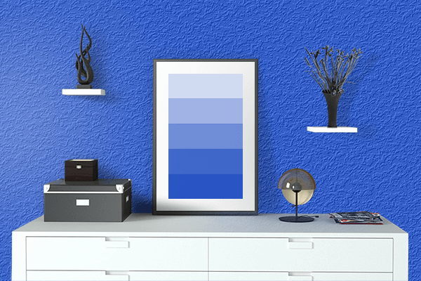 Pretty Photo frame on Palatinate Blue color drawing room interior textured wall