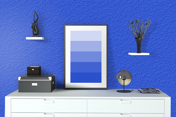 Pretty Photo frame on Blue (RYB) color drawing room interior textured wall