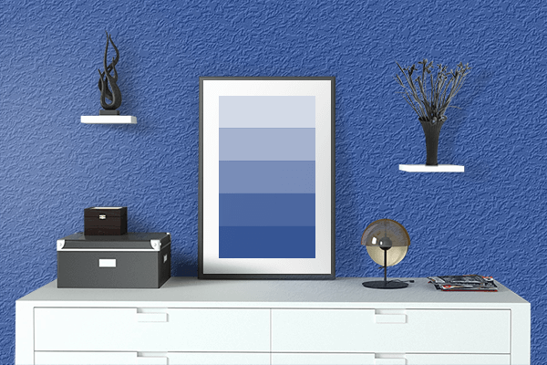 Pretty Photo frame on Cyan Cobalt Blue color drawing room interior textured wall