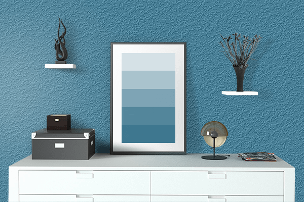 Pretty Photo frame on Teal Blue color drawing room interior textured wall