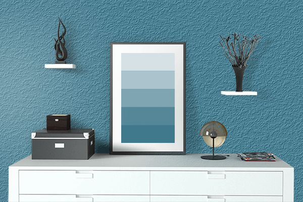 Pretty Photo frame on Teal Blue color drawing room interior textured wall