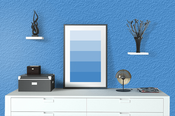 Pretty Photo frame on Bleu De France color drawing room interior textured wall