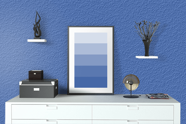 Pretty Photo frame on Han Blue color drawing room interior textured wall
