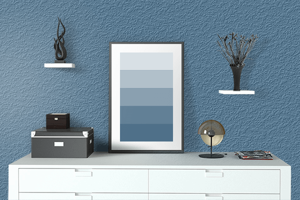 Pretty Photo frame on Jelly Bean Blue color drawing room interior textured wall