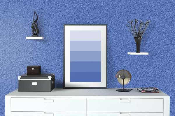 Pretty Photo frame on Han Blue color drawing room interior textured wall