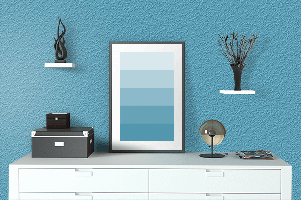 Pretty Photo frame on Maximum Blue color drawing room interior textured wall