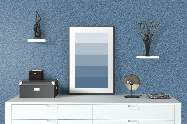Pretty Photo frame on Blue Yonder color drawing room interior textured wall