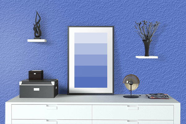 Pretty Photo frame on Royal Blue color drawing room interior textured wall