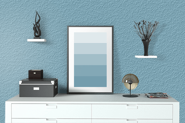 Pretty Photo frame on Moonstone Blue color drawing room interior textured wall