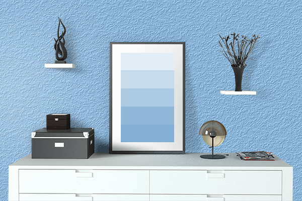 Pretty Photo frame on Light Sky Blue color drawing room interior textured wall