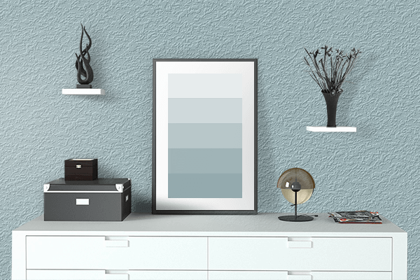 Pretty Photo frame on Pastel Blue color drawing room interior textured wall