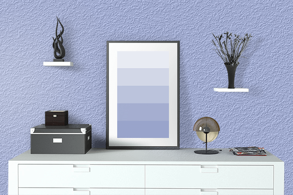 Pretty Photo frame on Pale Cornflower Blue color drawing room interior textured wall