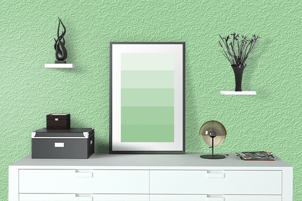 Pretty Photo frame on Celadon color drawing room interior textured wall