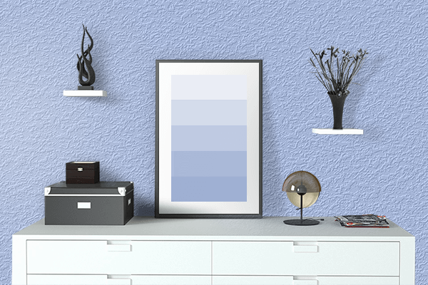 Pretty Photo frame on Pale Cornflower Blue color drawing room interior textured wall