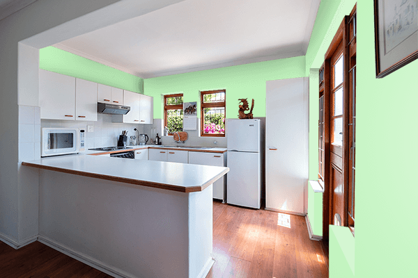 Pretty Photo frame on Tea Green color kitchen interior wall color