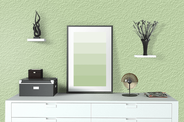 Pretty Photo frame on Tea Green color drawing room interior textured wall
