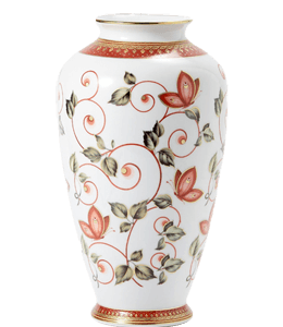 Butterflies and leaves on white ceramic vase