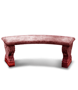 Carved red stone garden bench