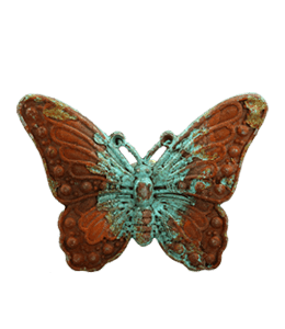 Copper butterfly brooch with verdigris