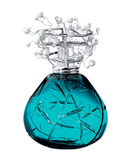 Decorated teal color perfume bottle