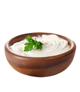 Fresh cream in wooden bowl