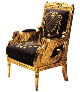 Gold chair carvings and with extremely fancy upholstery