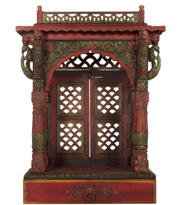 Green and maroon wood carving