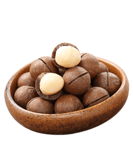 Macadamia nuts in wooden bowl