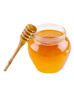 Organic honey in glass jar