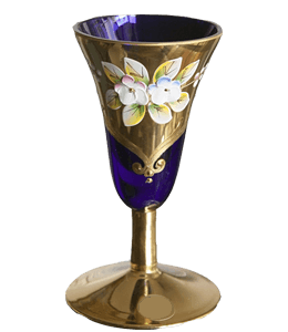 Painted wine glass with gold embellishments and stem