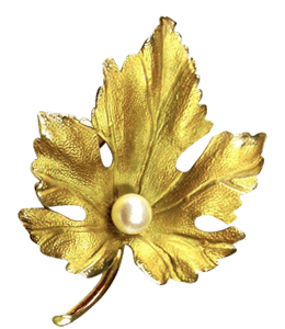 Pearl on golden leaf