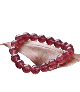 Rose gold colored marble bracelet with dry leaf