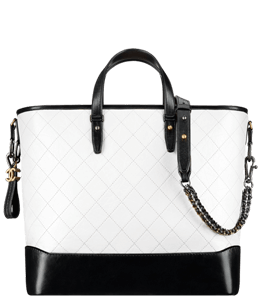 White ladies handbag with black lining