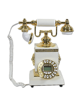 White vintage telephone with gold embellishments
