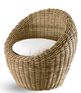 Wicker chair with white cushion